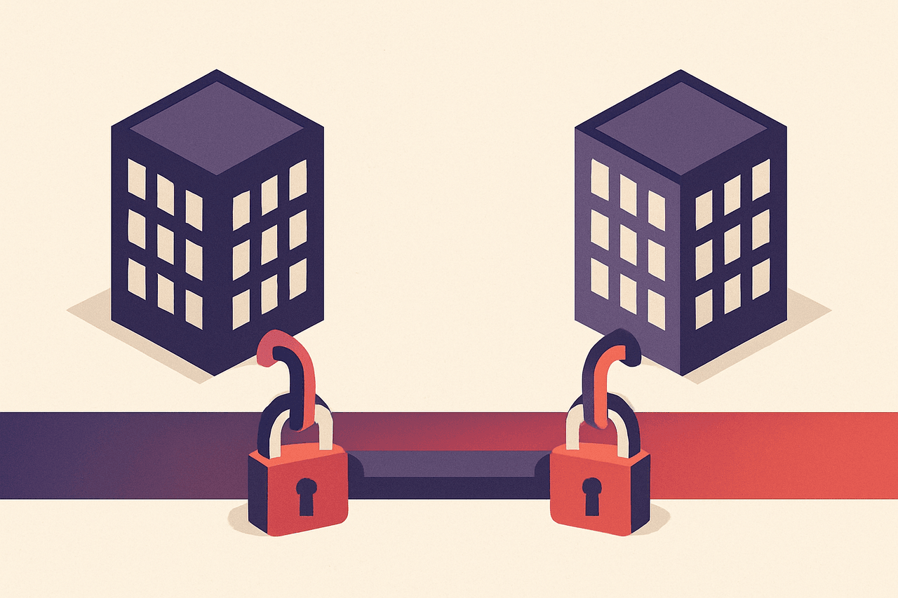 Two office buildings joined by a sealed pipeline running underground between them, with a padlock clamped over the pipe at each end.